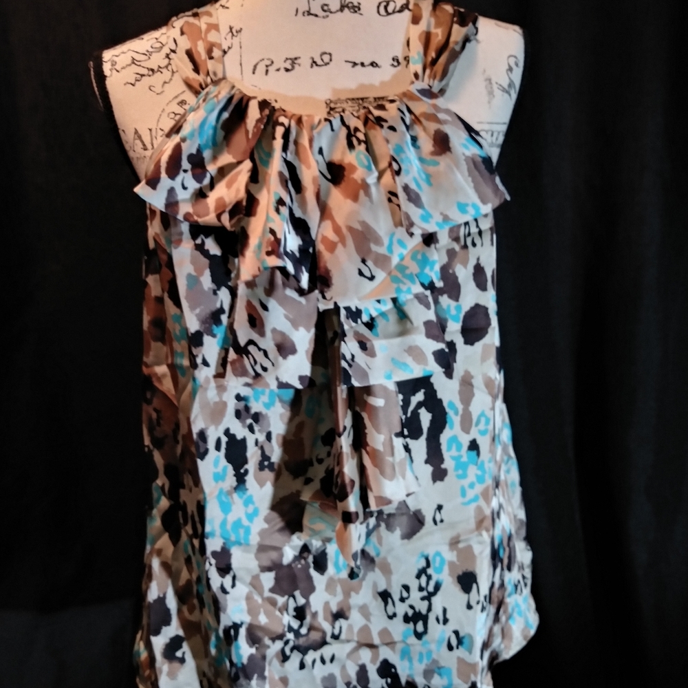 Super cute dress up or dress down silky tank